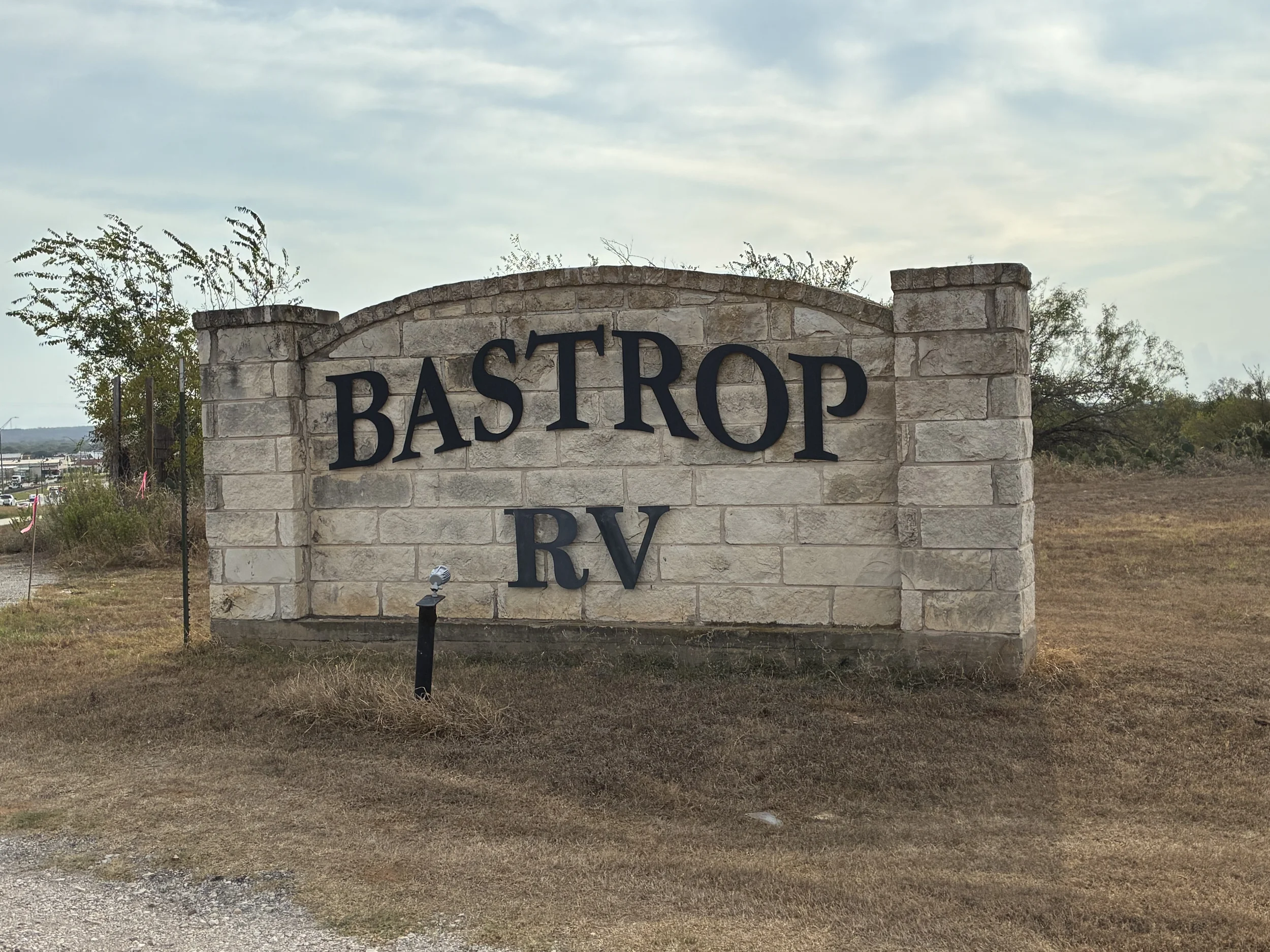 Stone sign that reads 